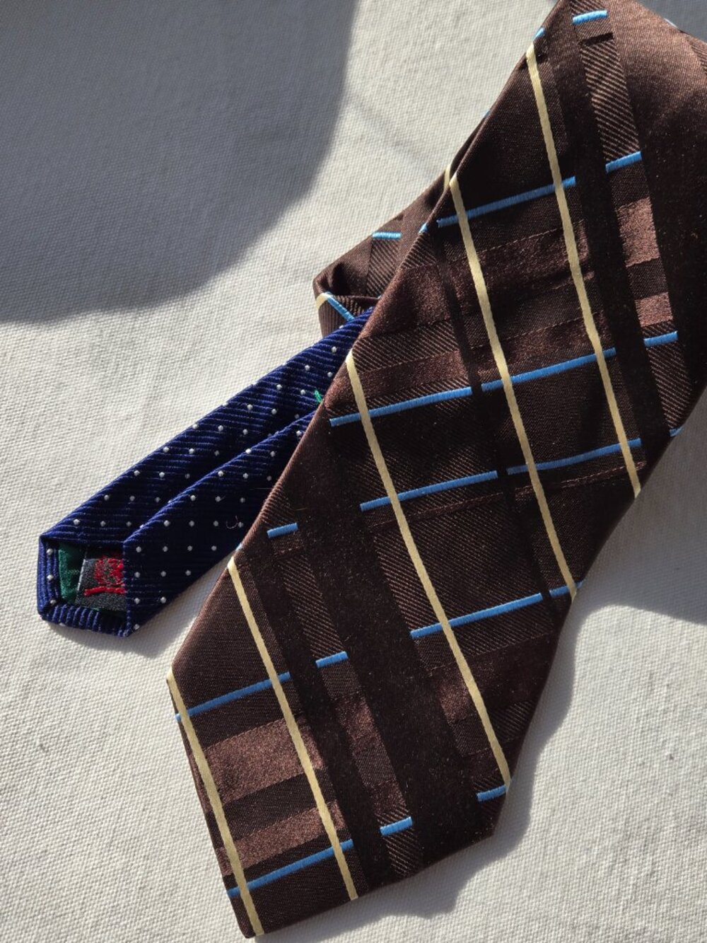 Tommy Hilfiger 100% silk diagonal plaid brown, blue, and gold/cream tie